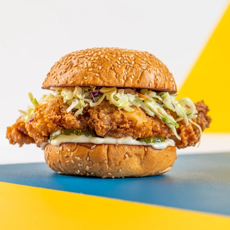 An image of the fried chicken sandwich at Poached.