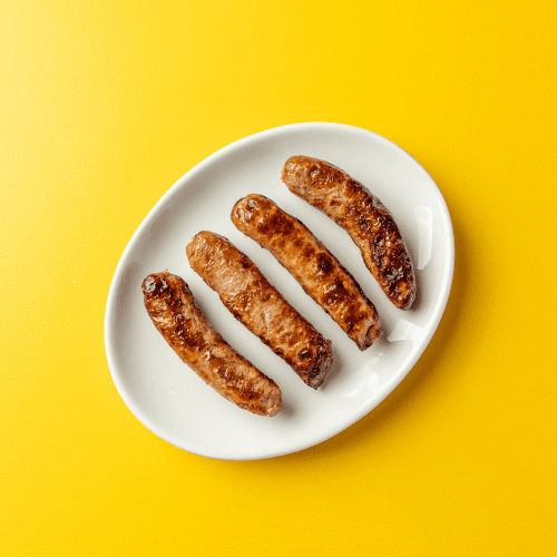 Four chicken apple sausage links