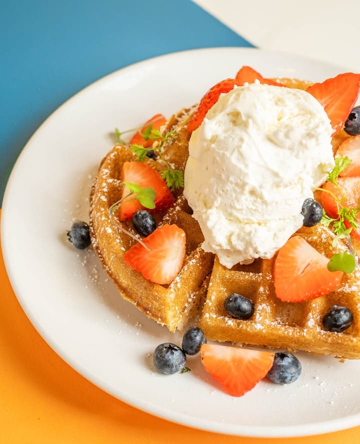 Classic Belgian Waffle with whipped cream and berries