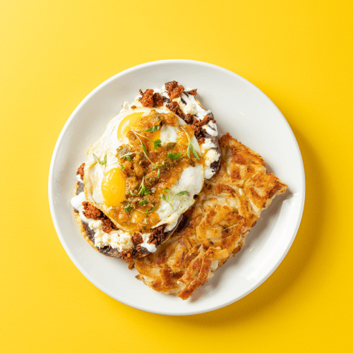 Huevos Rancheros with sunny up eggs and salsa